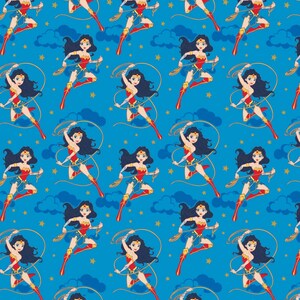 DC Comics Fabric Young Girl Heroes With Glitter in Blue Premium Quality 100% Cotton Fabric From Camelot