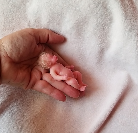 silicone babies that open and close eyes