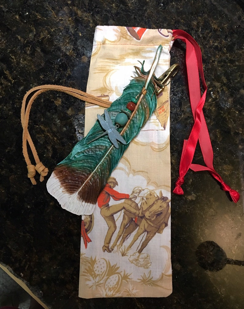 Leather saddle feather Etsy