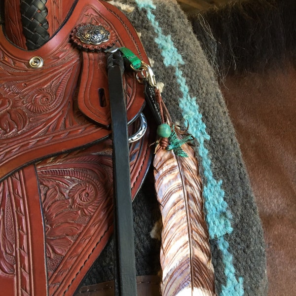 Saddle feathers