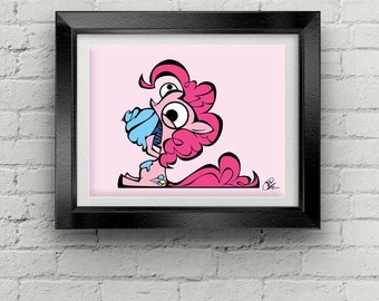 May include: A pink cartoon pony with a blue cupcake in its mouth. The pony has a single large eye and a pink mane. The background is pink.