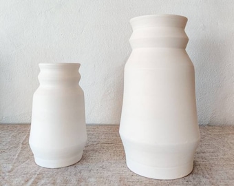 Geometrical white clay vase