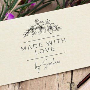 May include: A brown paper tag with a black floral design and the text 'Made with Love by Sophia'.