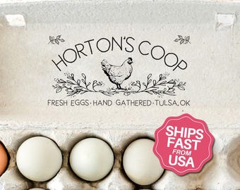 May include: An open egg carton with a dozen eggs in various shades of white, green, and peach. The carton is labeled "Horton's Coop" with text that reads "Fresh Eggs - Hand Gathered - Tulsa, OK." A pink sticker says "Ships Fast From USA."