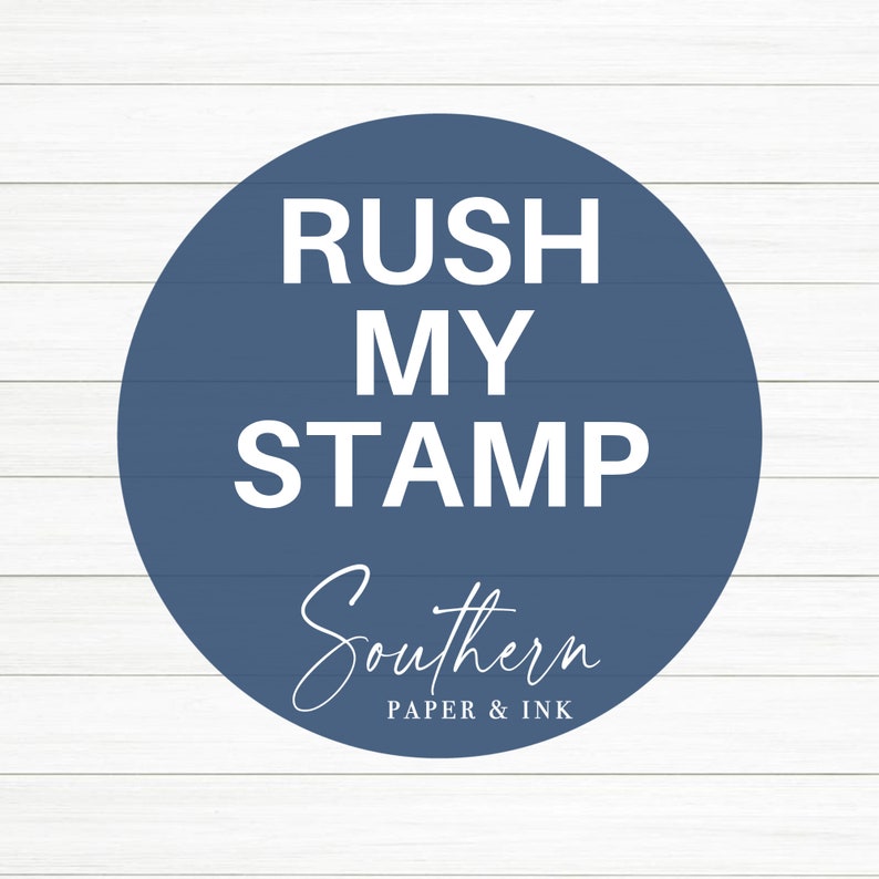 May include: A navy blue circle with the words "RUSH MY STAMP" in white block letters. Below, in cursive, is the word "Southern" and the text "PAPER & INK". The background is white horizontal wooden planks.