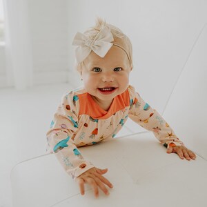 Baby Strampler aus Bio-Baumwolle mit Ozean-Print