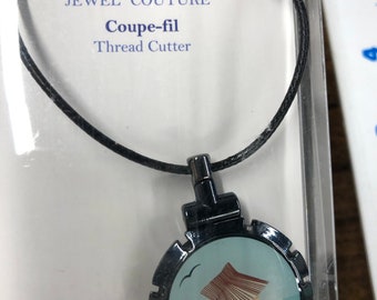 Thread cutter pendant, The Sweet Escape