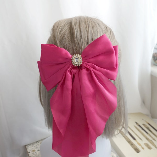 Glamorous Statement Piece: Hot Pink Satin Hair Bow with Stunning Long Tail