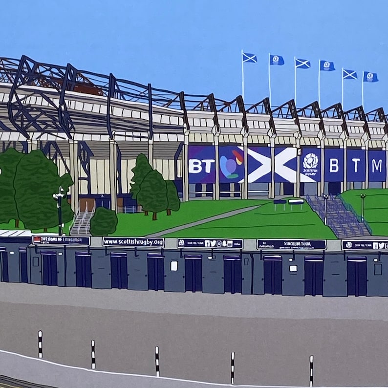 May include: An illustration of a rugby stadium with a blue and white color scheme. The stadium has a large sign that says "BT Murrayfield" and a smaller sign that says "BT". There are also several flags flying in the wind.