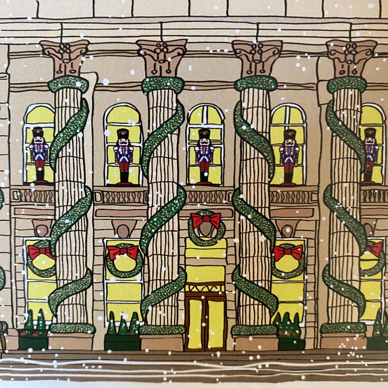 May include: A building with columns decorated with green garlands and red bows.  Each window has a toy soldier figurine inside.  The building has a large double door entrance.