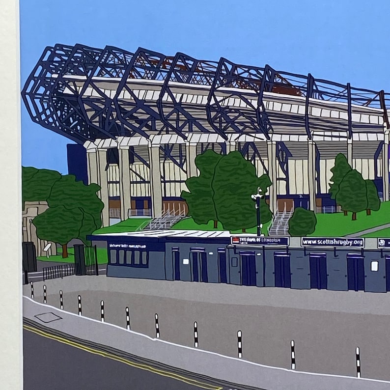 May include: A colorful illustration of a large stadium with a blue and white color scheme. The stadium is surrounded by trees and a small building with the text "The Home of Edinburgh" and "www.scottishrugby.org".