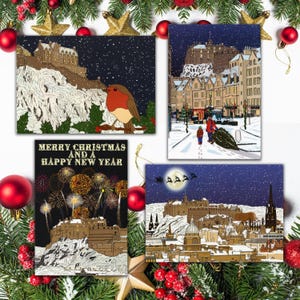 May include: Four Christmas cards with illustrations of Edinburgh, Scotland. One card features a robin, another a snowy street scene, a third with fireworks and text, and the last with Santa's sleigh.