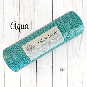May include: A roll of aqua-colored fabric mesh. The mesh is made of polyester and polypropylene. The label reads "Fabric Mesh" and describes the mesh as waterproof and ideal for floral wrapping and decoration. The roll is 10 yards long.