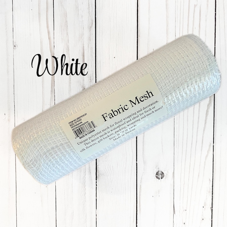 May include: A roll of white fabric mesh for floral wrapping and decoration. The label reads "Fabric Mesh" and mentions it is waterproof and ideal for fresh or silk flowers, gift baskets, and more. The size is 10 x 10 yards.