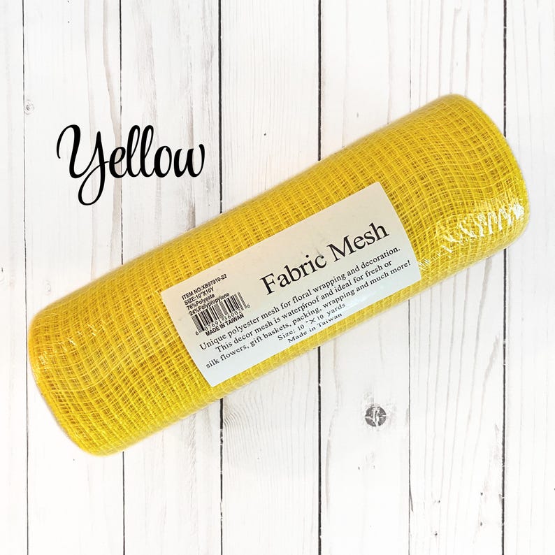 May include: A roll of bright yellow fabric mesh for floral arrangements and decorations. The label reads "Fabric Mesh" and mentions it's waterproof and ideal for various uses. The roll is 10 inches by 10 yards.