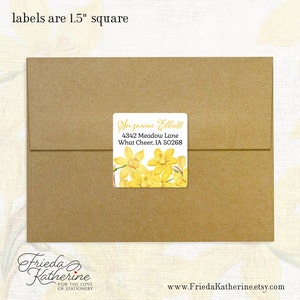 May include: A 1.5 inch square label with a floral design featuring yellow daffodils. The label has the text "Suzanne Elliott", "4342 Meadow Lane", "What Cheer, IA 50268" printed in black.