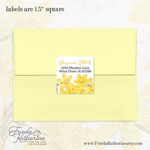 May include: A yellow envelope with a 1.5 inch square label featuring a watercolor illustration of yellow daffodils and the text "Suzanne Elliott, 4342 Meadow Lane, What Cheer, IA 50268".