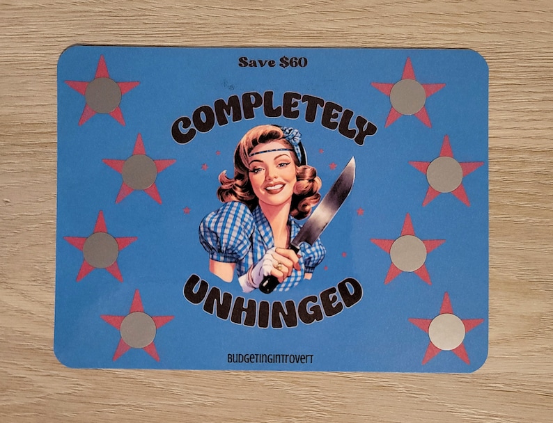May include: A blue and pink card with a retro-style illustration of a woman holding a knife. The text on the card reads "Save &pound;48 Completely Unhinged Budgetingintrovert".