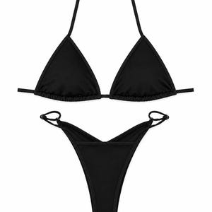 May include: A solid black two-piece bikini set featuring a triangle top with thin spaghetti straps and matching high-cut bikini bottoms with side ring details. The swimwear is constructed from a smooth, matte fabric with clean, minimalist lines.
