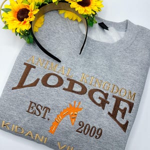 Animal Kingdom Lodge Embroidered Sweatshirt | Disney Resort Embroidered Crewneck