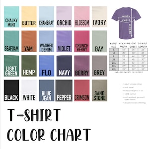 May include: A color chart for adult heavyweight t-shirts, featuring a variety of colors like Chalky Mint, Butter, and Black. The chart includes a size guide with measurements in inches for width, chest, and length, and details about the fabric.