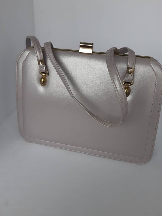 1960s Mauve Leather Top Handle Bag.
