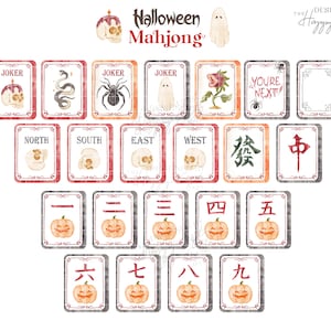 May include: A Halloween-themed Mahjong set featuring watercolor illustrations. The tiles display spooky images like skulls, ghosts, spiders, and pumpkins. Text includes "JOKER", "YOU'RE NEXT", and Chinese characters. The set is designed by The Happy Gift Art.