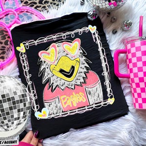 Camiseta com estampa do mascote Eagles em estilo preppy com glitter / Design digital APENAS