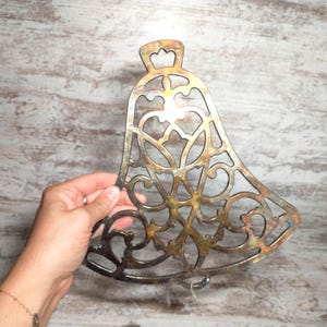 Vintage Bell Shaped Metal Trivet: Ornate Kitchen Decor