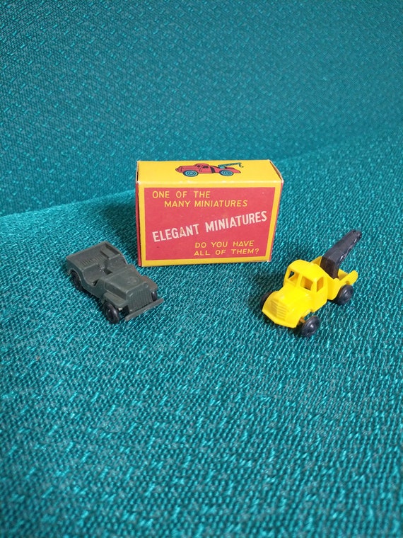 Old toy cars in top box