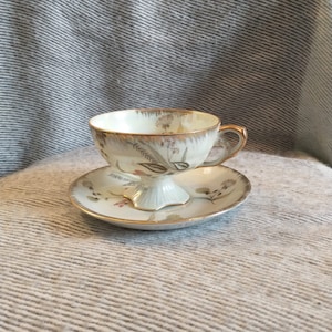 Vintage Kelvin Japan Floral Cup and Saucer Set: Iridescent Collectible