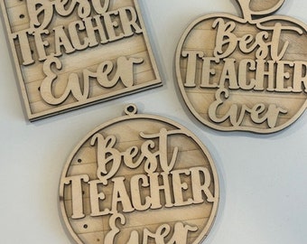 May include: Three wooden ornaments with the text "Best Teacher Ever" in different styles. One ornament is a square, one is a circle, and one is an apple shape.