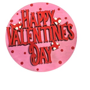 May include: A pink circle with white polka dots and the words "Happy Valentine's Day" in red.