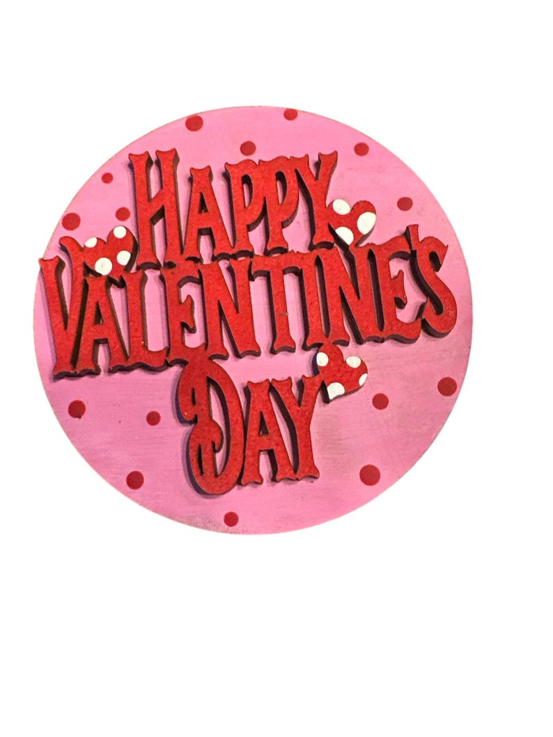 May include: A pink circle with white polka dots and the words "Happy Valentine's Day" in red.
