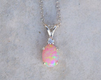 BTS-NP9872/PPO/R Sterling Silver Pendant with Oval Pink Simulated Opal Stone BTS-NP9872/PPO/R Sterling Silver Pendant with Oval Pink Simulated Opal Stone