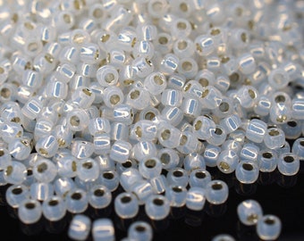 390 EUR/kg || Toho Seed Beads 11/0 Silver Lined Milky White