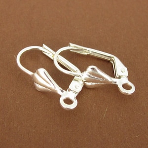 10 pieces of ear wires, decorated - silver coloured