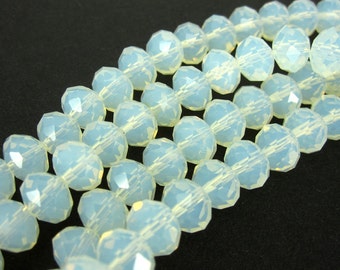 50 pieces of faceted glass cut beads, milky white, 6 x 8 mm