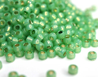 370 EUR/kg || Toho Seed Beads Silver Lined Milky Peridot | Seed Beads DIY Schmuck, verschiedene Größen, 11/0, 8/0, 6/0