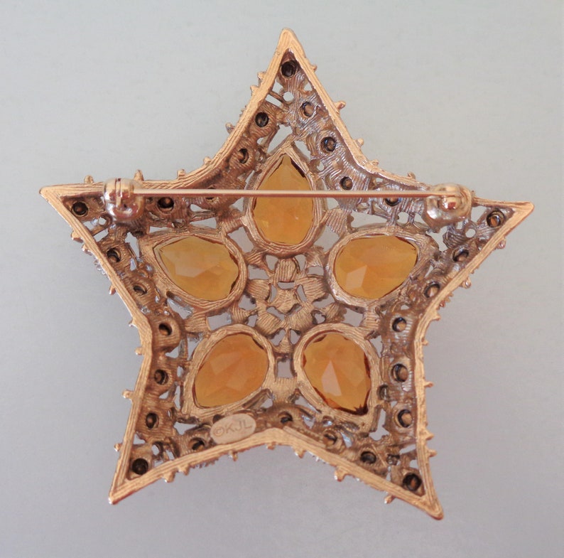 NIB. Open Work Signed Kenneth Jay Lane Citrine Orion Star Brooch Old Stock Authentic KJL