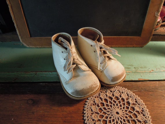 white hard sole baby shoes