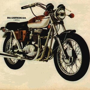 May include: A white and red BSA Lightning 650 motorcycle with chrome accents. The motorcycle has a black seat and a black exhaust pipe. The motorcycle is on a light brown background.