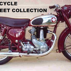 May include: A red BSA motorcycle with a chrome gas tank and exhaust. The motorcycle has a silver emblem on the tank and a black seat.