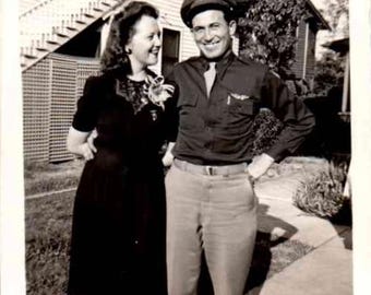 1940s - Man and woman celebrating their wedding day.  A Vintage Original Photo
