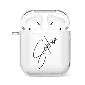 Puede incluir: Una funda transparente blanca para auriculares inal&aacute;mbricos con una firma cursiva negra que dice "Sophia" en la parte delantera.