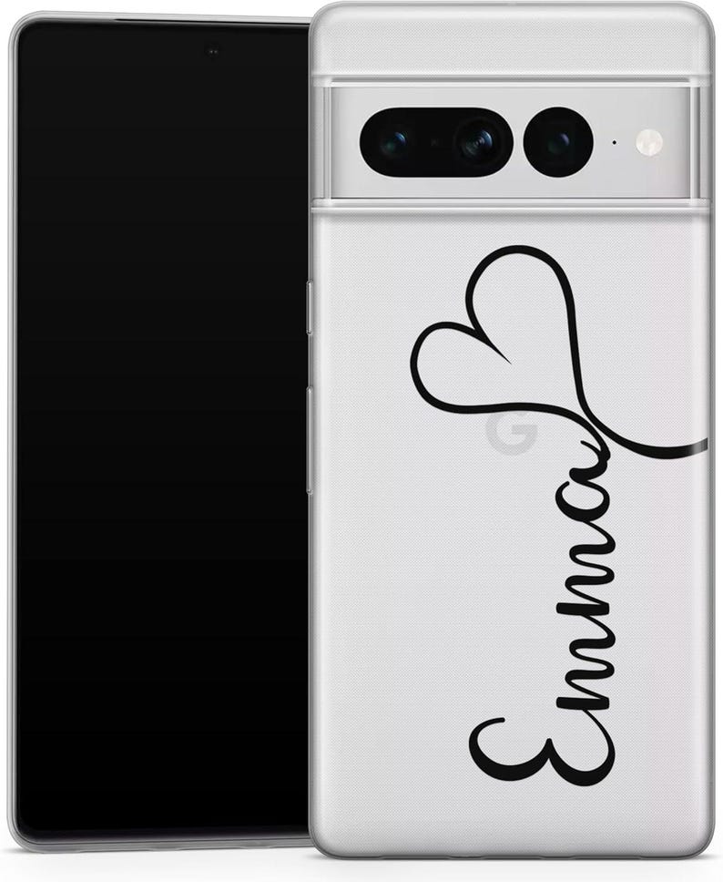 May include: Clear phone case with a black heart and the name "Emma" in a cursive font. The case is on a black smartphone. The phone case has a camera cutout.