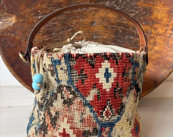 Vintage kilim bag, leather bucket bag with shoulder straps, tobacco pouch closure with decorative beads, measures 20x17 cm