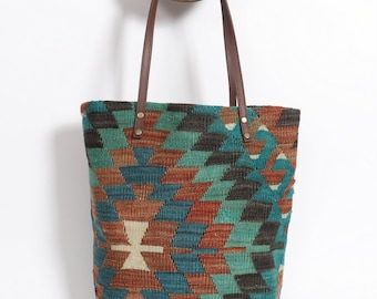 Vintage  Kilim handbag, with "ELIBELINDE"pattern, symbolizes happiness and fertility, leather handles