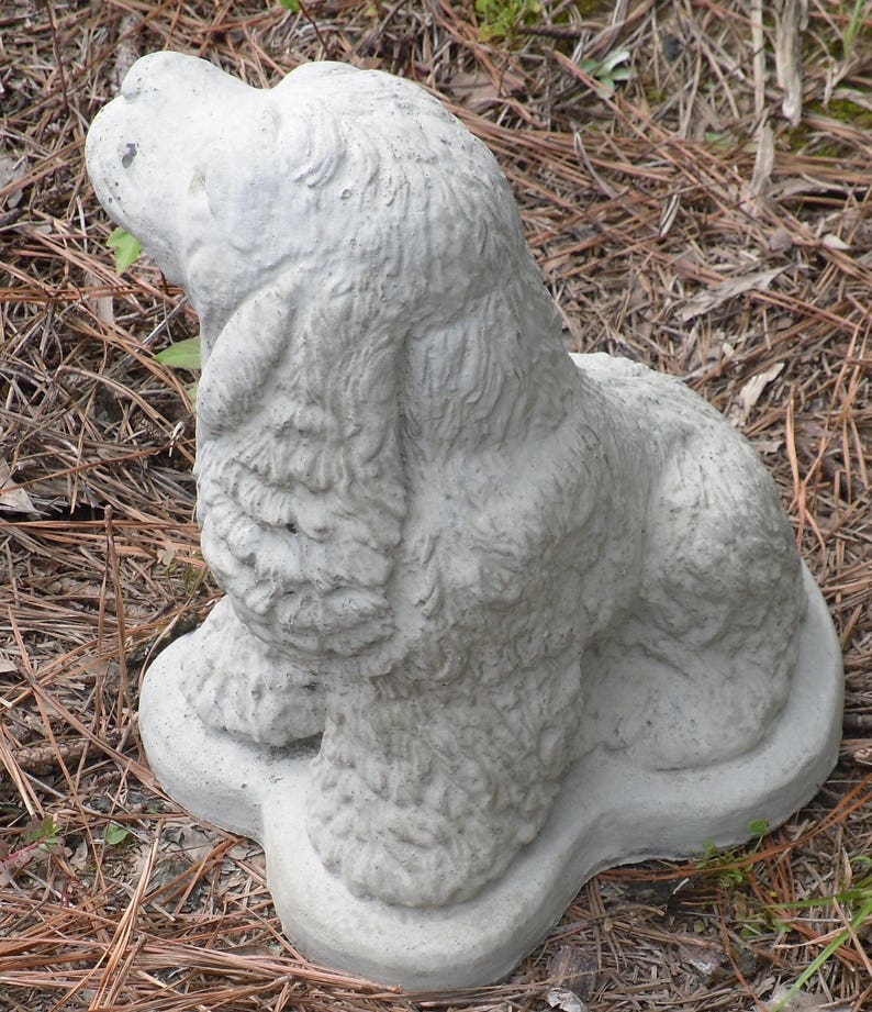 cement cocker spaniel statue