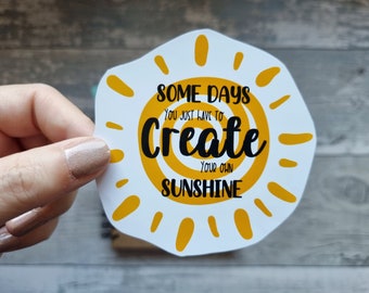 Crea tu propia calcomanía de sol: vinilo brillante para portátil